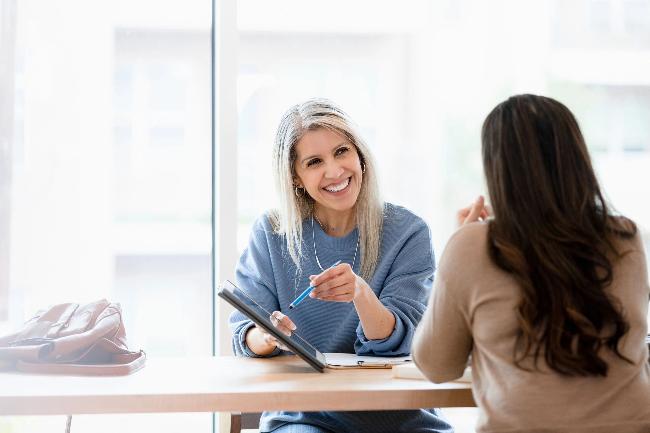 Financial advisor meeting with a client to discuss insurance planning