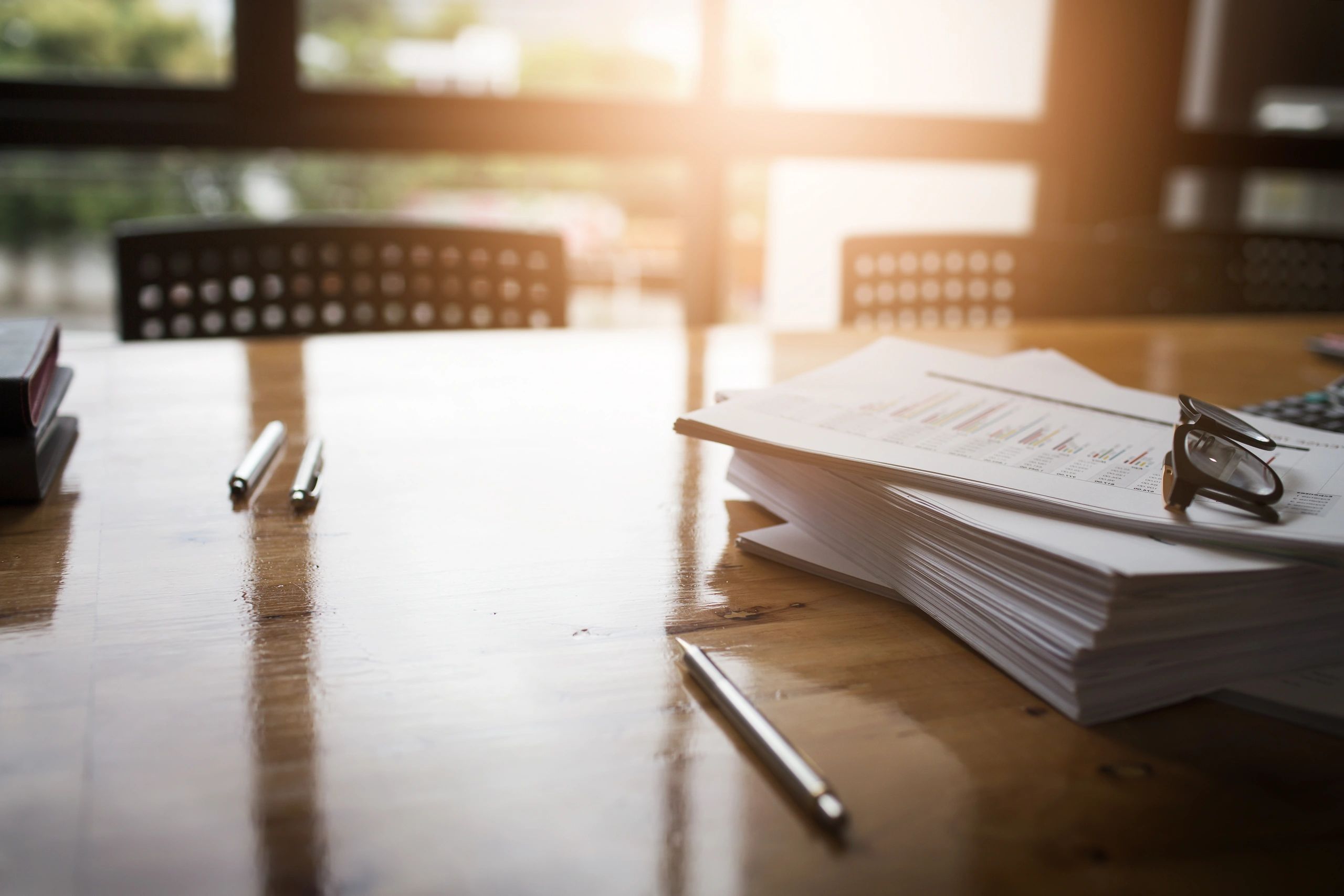 Insurance and financial documents on a desk